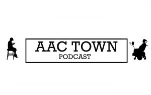 The words "AAC TOWN PODCAST" are boxed, with a silhouette of a man sitting in a chair going on his phone to the left and a silhouette of a man in a wheelchair on the right